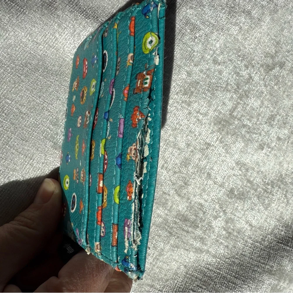 Disney Pixar Teal Character Print Wallet OS